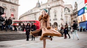 old fashioned woman in piccadilly circus